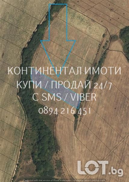 кодг 63225. Поземлен имот 3200м2 на около километър от селото и 200м о