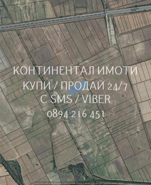 Код 63027. Поземлен имот 8000м2, кат. 4-та, на около 1,5 км северно от