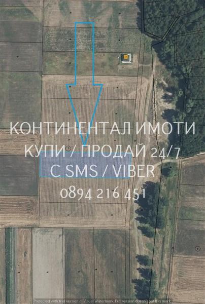 кодл 63176. Нива 4700м2, кат. 5-та,  само на 250м от къщите, северно о