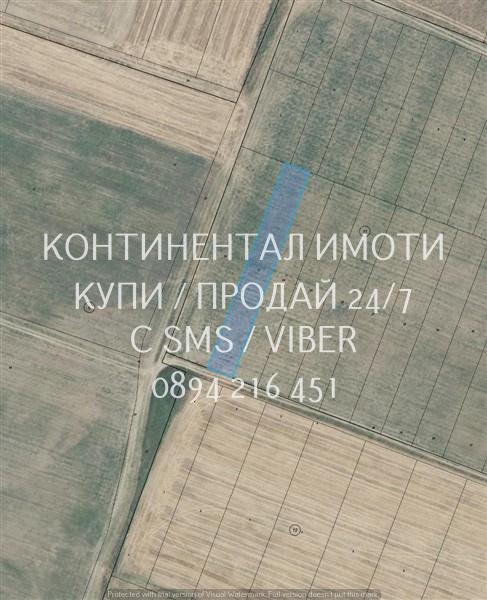 Код 63140. Нива 1130м2 с правилна форма намираща се северно от селето