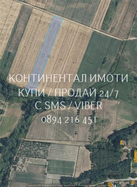 Код 63141. Нива 4700м2 с правилна форма намираща се северно от селето