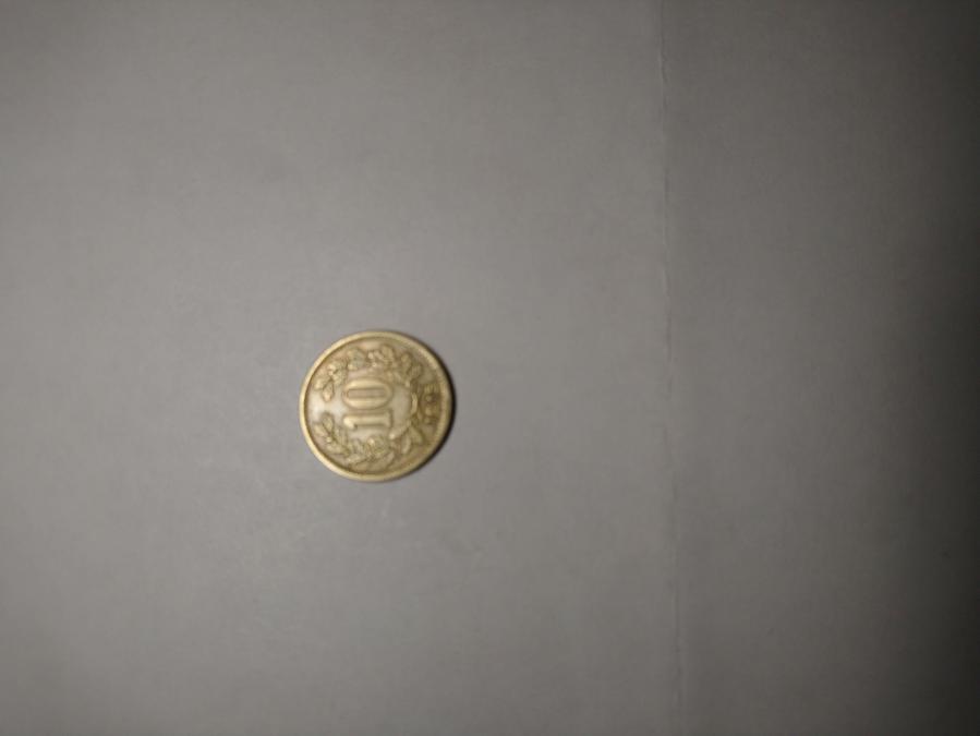 Монета 10 хелера 1915 г.