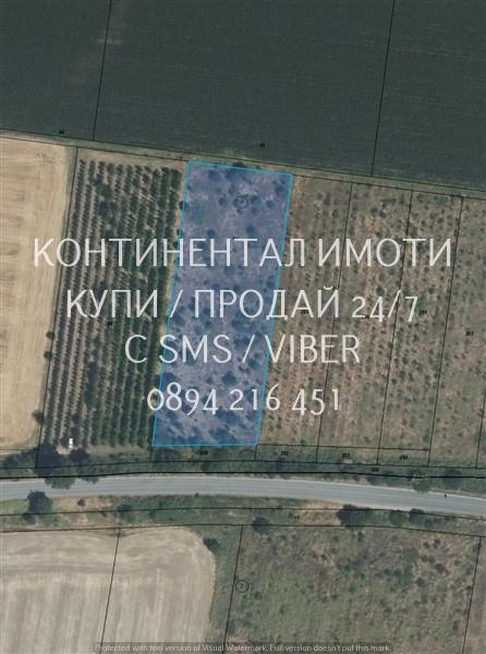 Код 63050. Парцел 6700м2 с локален път около 400м с лице 60м на шосето