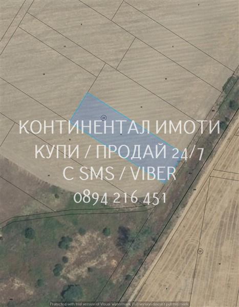 коддд 63114. Нива 1820м2 с правилна форма, на около 250 метра от шосе,