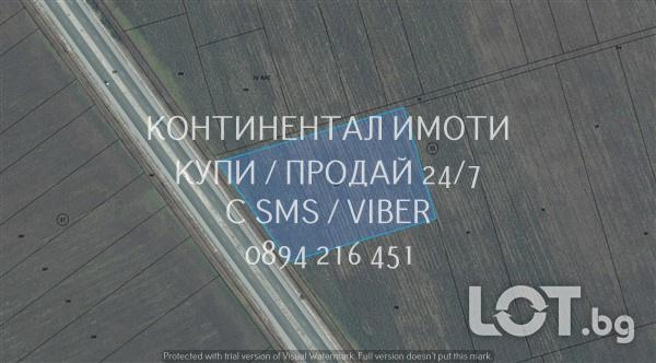 Код 70085. Поземлен имот 10430м2 с лице 90м на АМ Марица в близост до