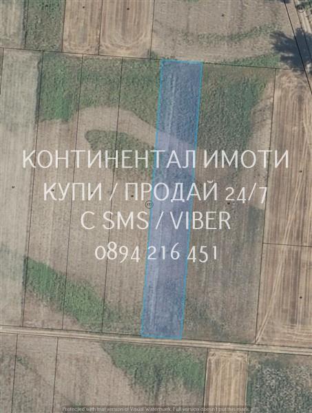 Код 63024. Поземлен имот 3дка - нива с правилна форма на втора линия о