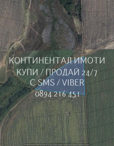Код 63199. Нива 10500м2 до общински път, което позволява безпроблемно