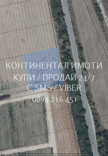 Код 63183. Поземлен имот 2200м2, който се намира непосредствено до път