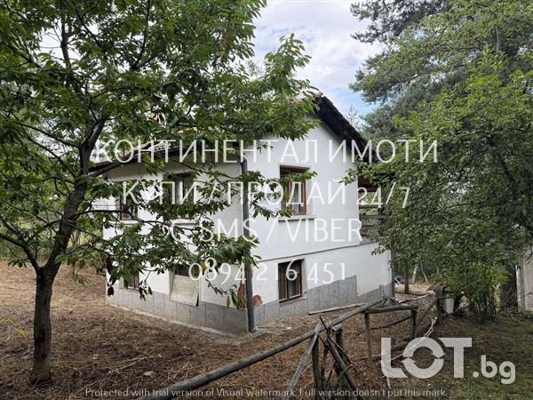 Код 70002. Двуетажна молотитна къща 180м2 с двор 500м2. Първият етаж е