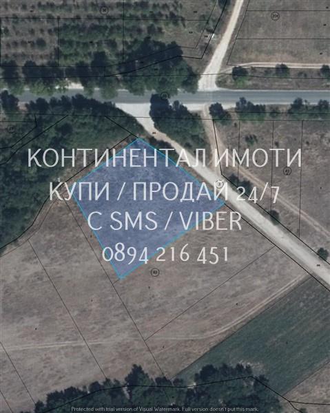 Код 63022. Поземлен имот 3дка, с лице нa асфалтиран път и на 20 метра