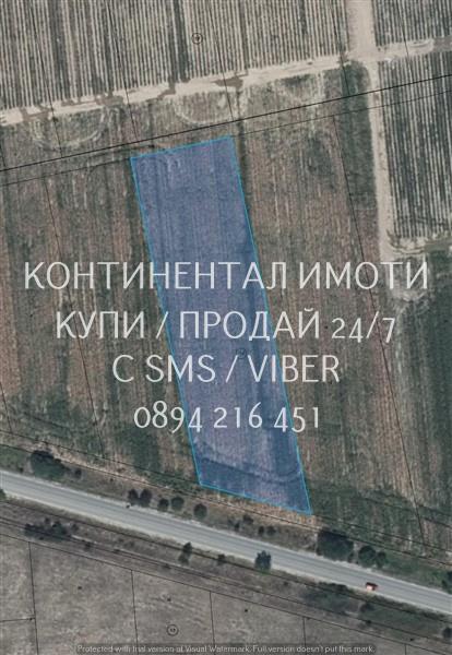 Код 63149. Поземлен имот 4200м2 с лице на асфалтов път 40 метра след р