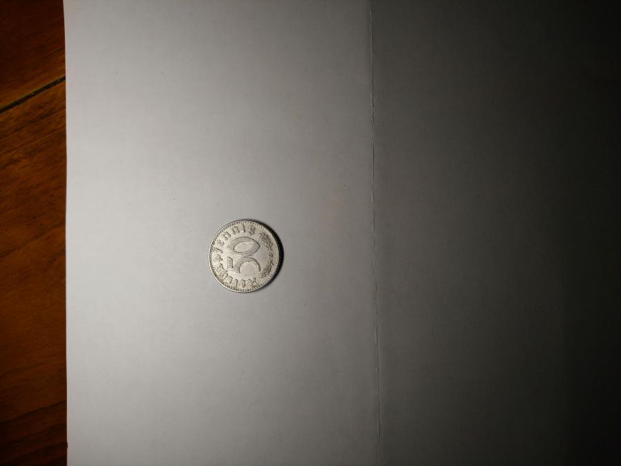 Монета 50 райхпфенинга 1935 г.