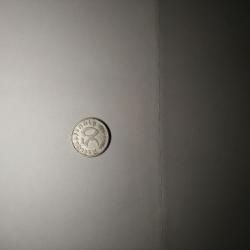 Монета 50 райхпфенинга 1935 г.