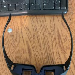 Очила за четене и гледане на телевизия в легнало положение