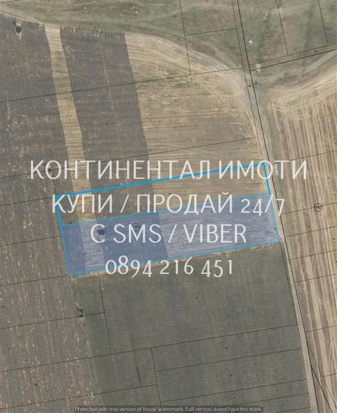 Код 63105.  Нива 8000м2 на 150 м от къщите на селото с трифазен ток, п..