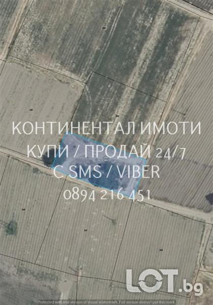 Код 70009. Поземлен имот 1140м2 с партида за ток, вода на сонда и пред