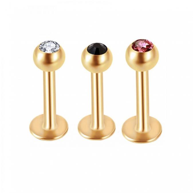 Златен пиърсинг на устни